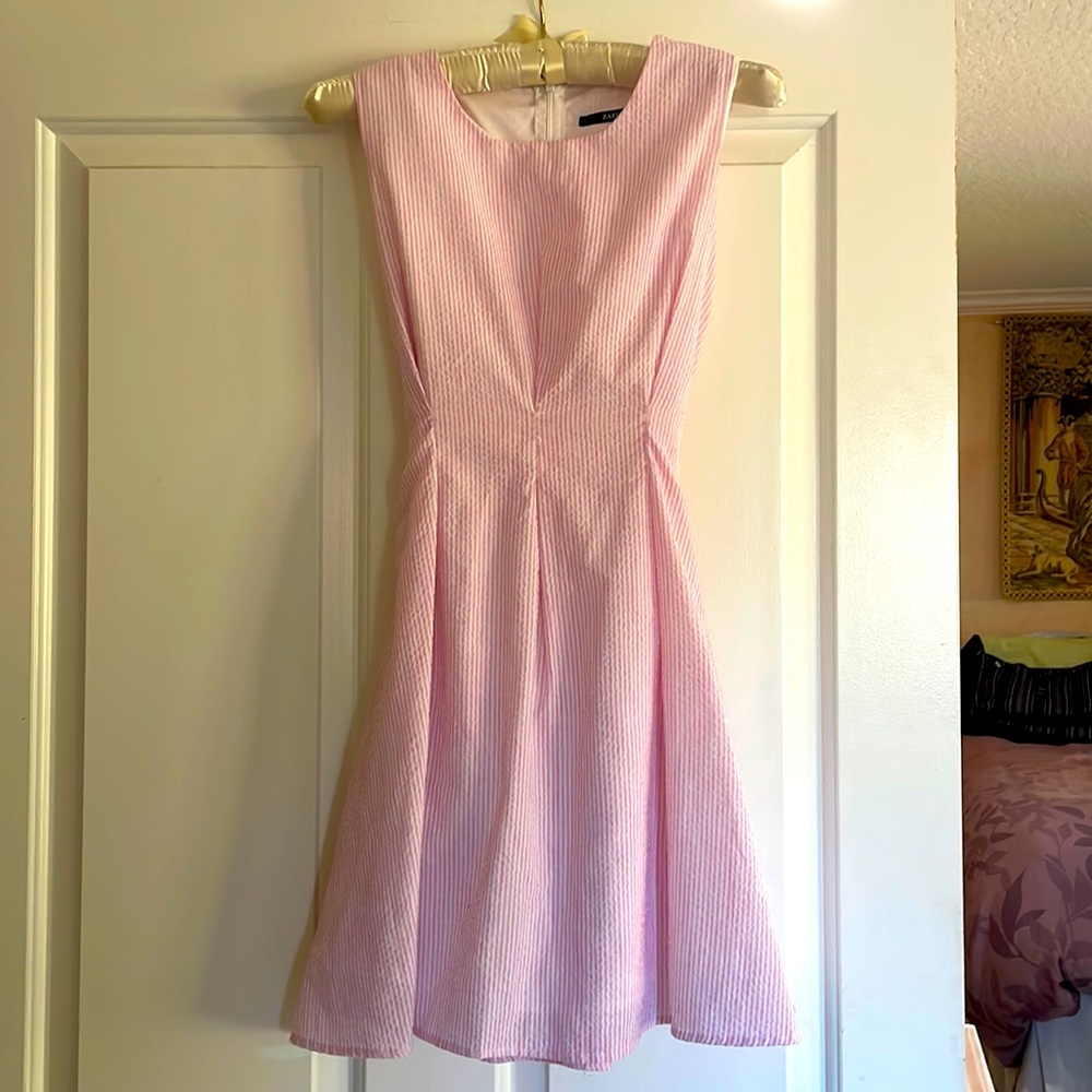 Beautiful pink and white striped dress with zipper back and bow tie